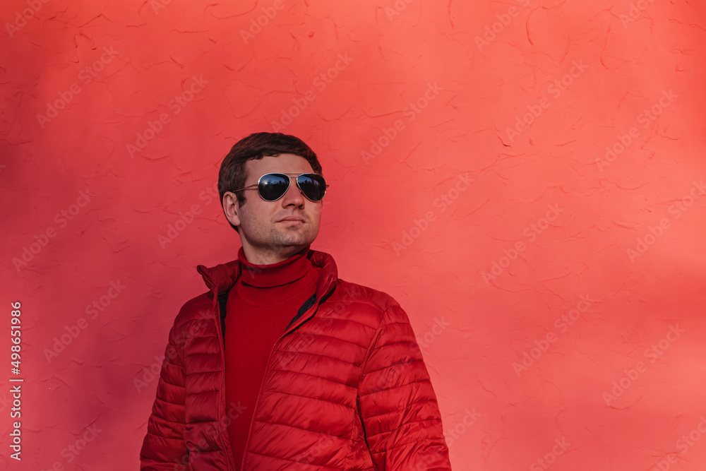 Young man in red sweater and jacket Young man in red sweater and jacket