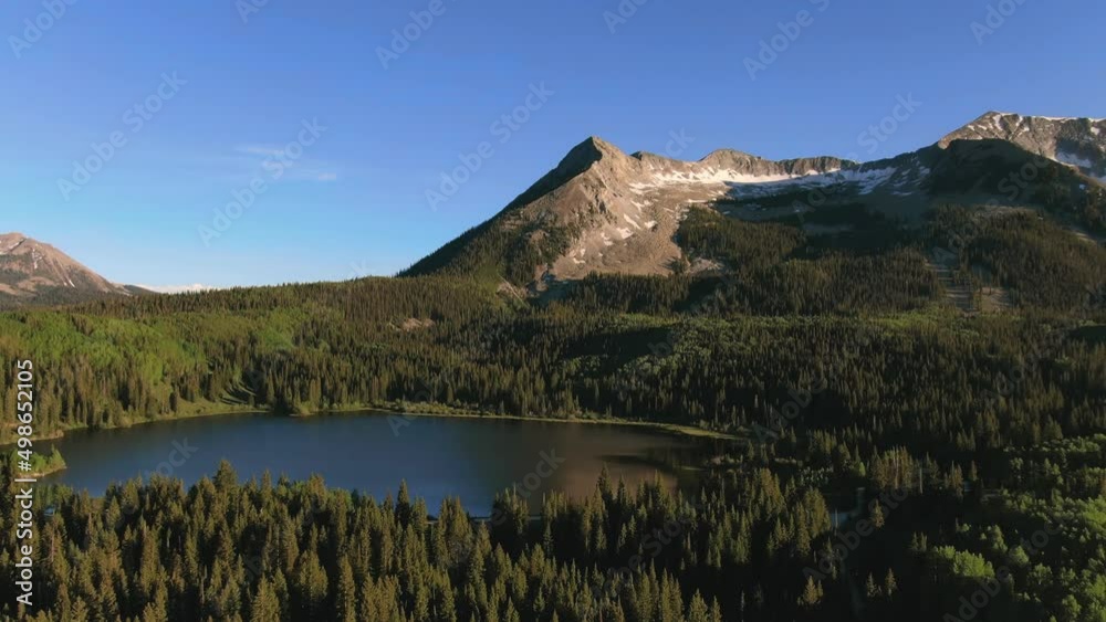 Drone Aerial View Flying Over Alpine Lake Near Beautiful East Beckwith Mountain In Kebler Pass, Colorado.