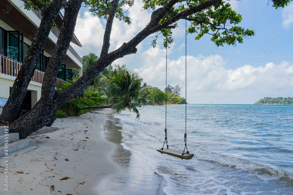 Swing hanging on a tree in the surf of the sea. Swing hanging on a tree in the surf of the sea.