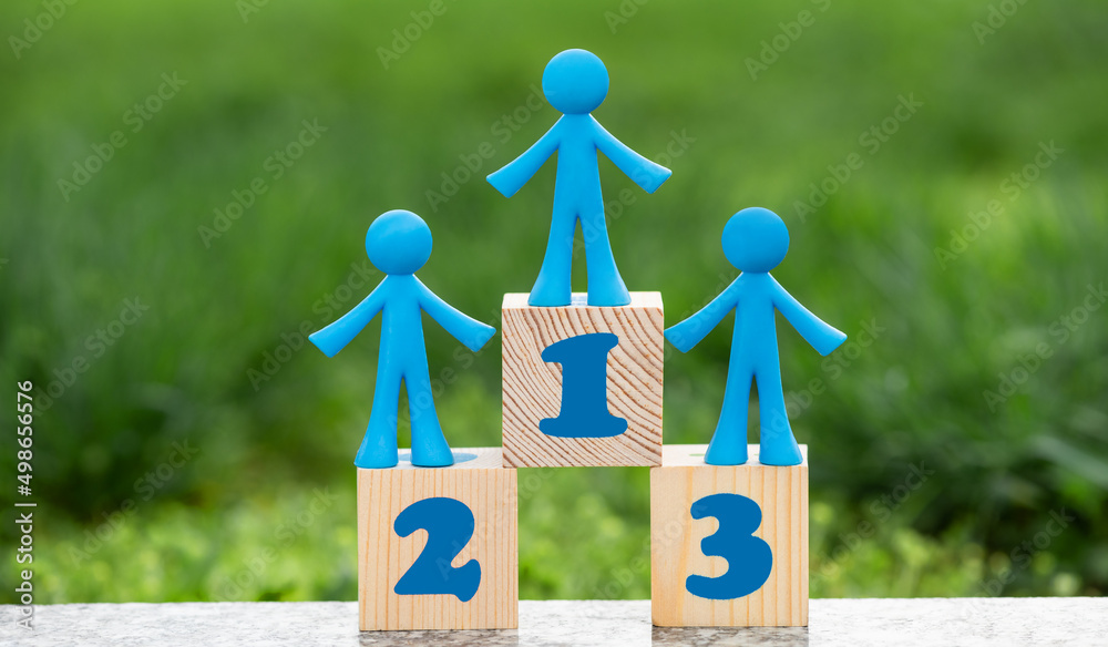 Obraz na plátně Symbolic figures of people on a pedestal with the numbers 1, 2, 3
