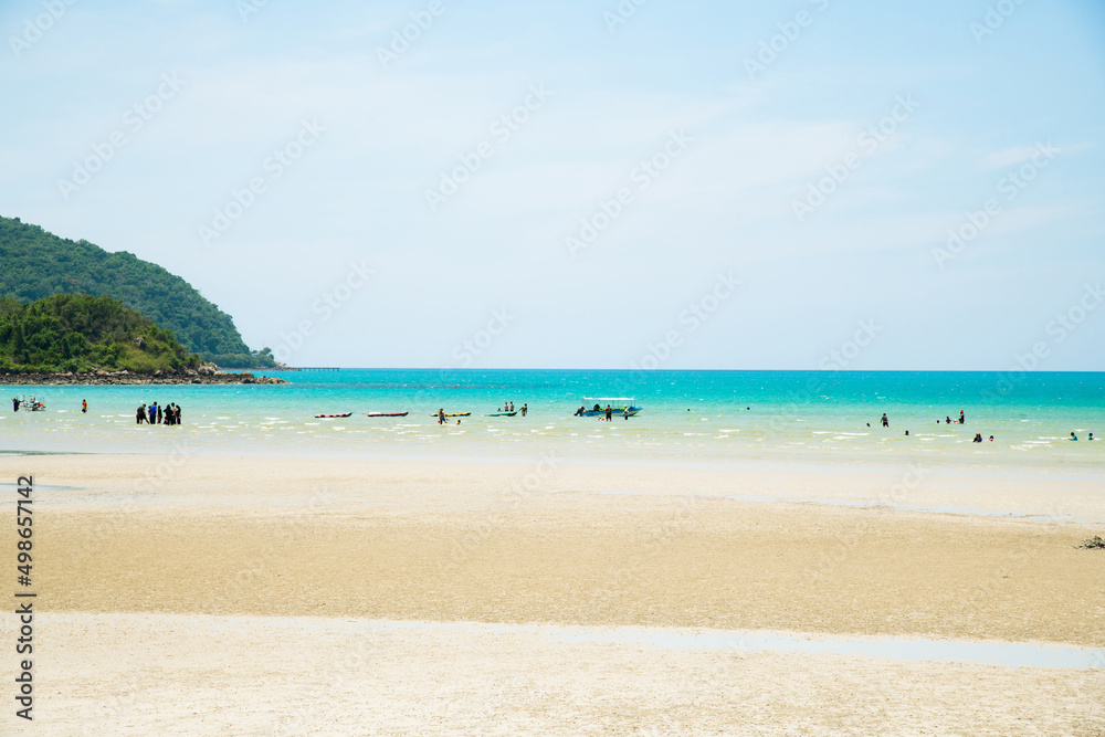 Landscape beach background in Thailand.light blue sky, sea wave and sand beach in pastel style. Concept of summer vacation and holiday tourism.