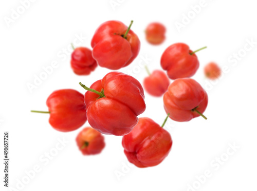 Acerola cherry levitate isolated on white background.
