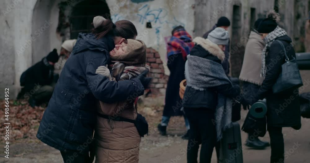 Man Consoling Immigrant Woman Crying During War. Man Consoling Immigrant Woman Crying During War.