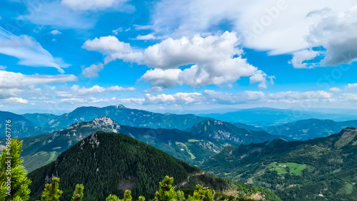 Panoramic view on the mountain peaks of Karawanks and Kamnik Savinja Alps in Carinthia, border Austria and Slovenia. Mountaineering. Freedom wanderlust hiking concept photo