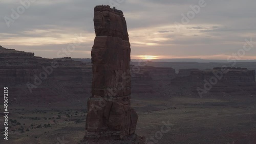 aerial view of monument valley in Utah Arizona desert sun setting skyline warm summer evening.