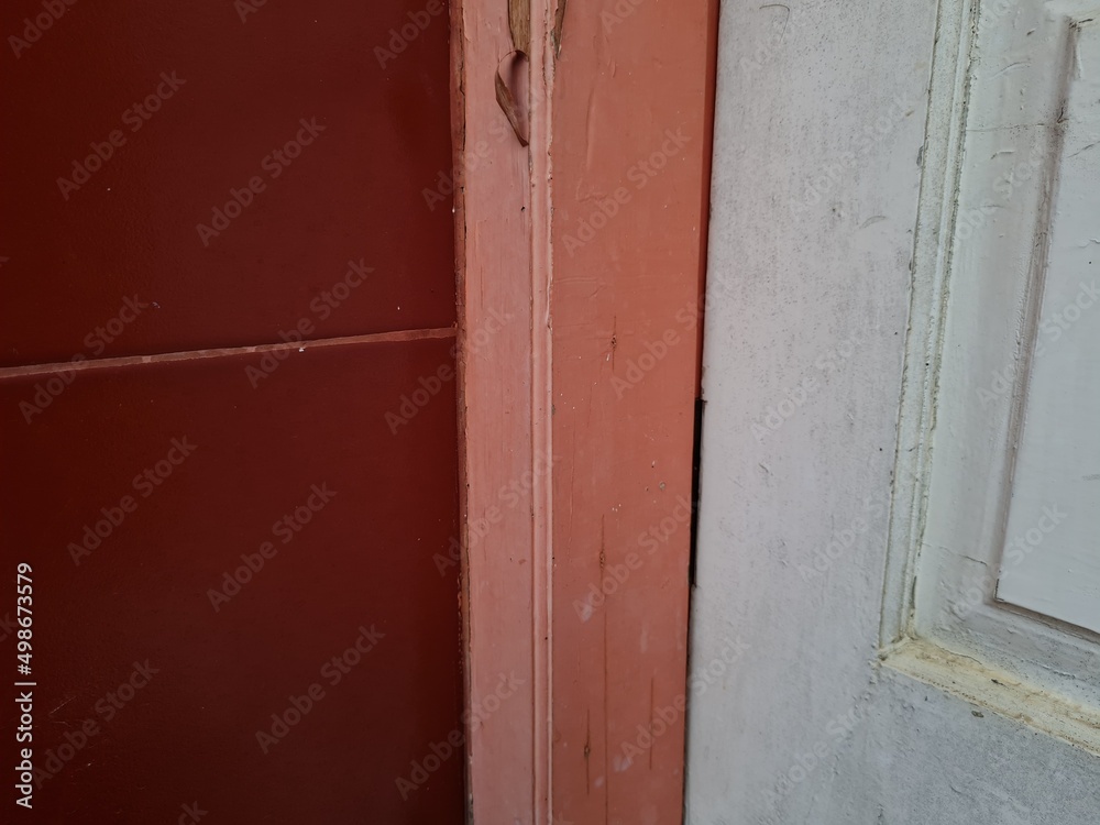 Image of white orange and red wooden door border