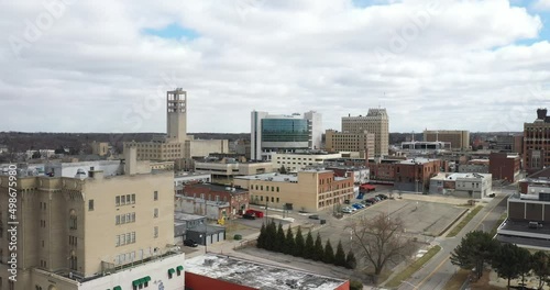 Downtown Pontiac, Michigan skyline with drone video moving up.