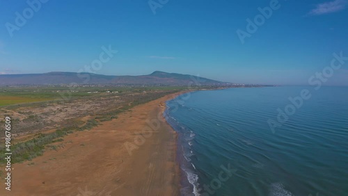 Aerial video of the shore of the Caspian Sea overlooking the city of Derbent.