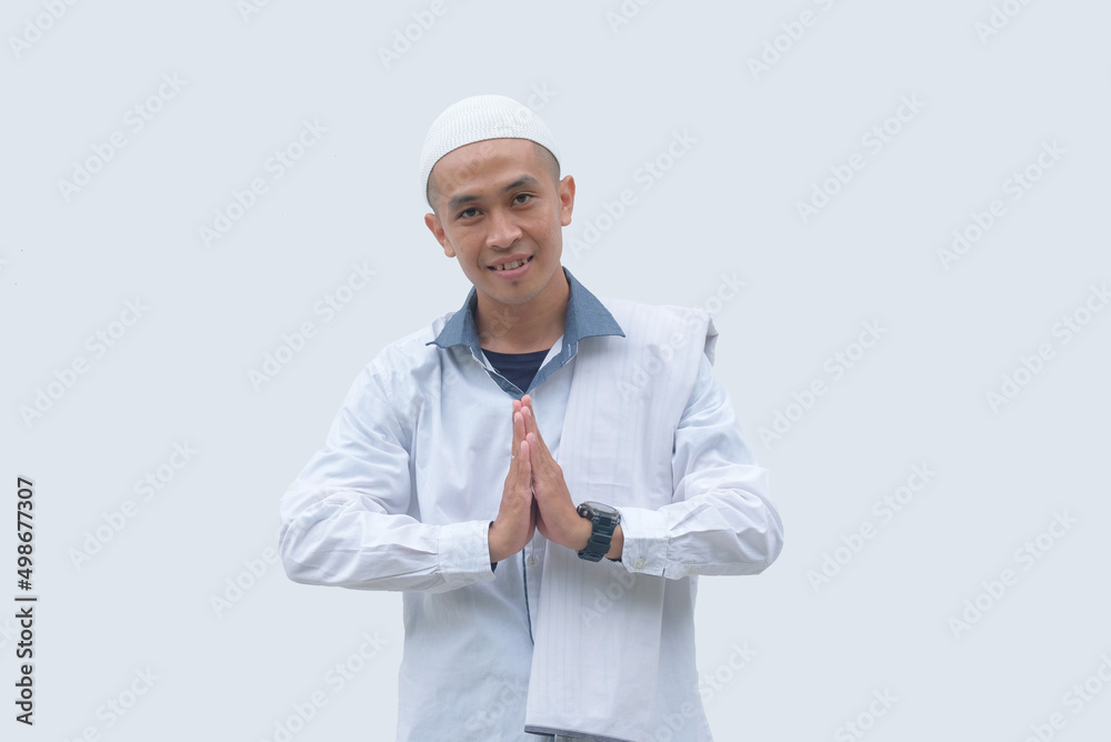 muslim man with greeting hand gesture muslim man with greeting hand gesture