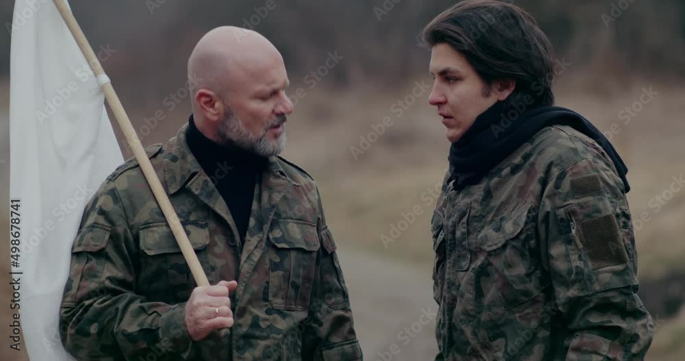 Army Man Holding White Flag Discussing With Soldier.