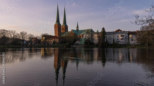 Germany, Luebeck, Luebeck Cathedral, Muehlenteich, Sunset Timelapse photo