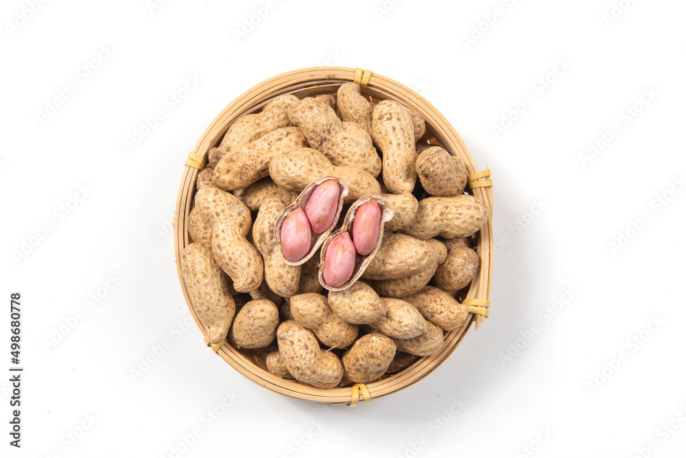 raw unpeeled peanut nuts isolated on white background. raw unpeeled peanut nuts isolated on white background.