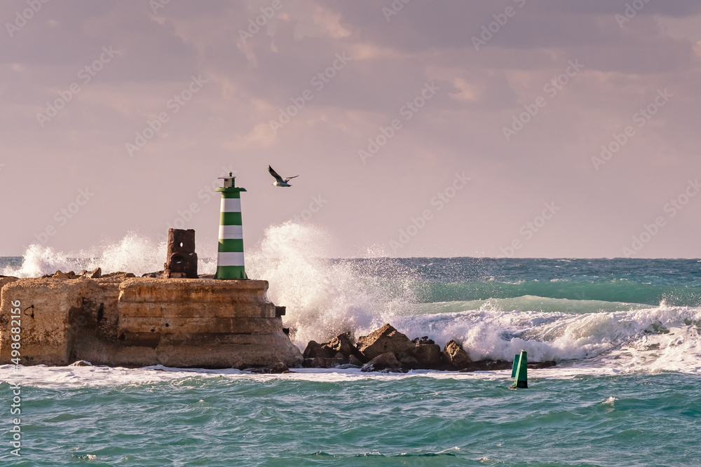 Tel Aviv-Yafo, Israel - December 19, 2021: Lighthouse in old Yafo port