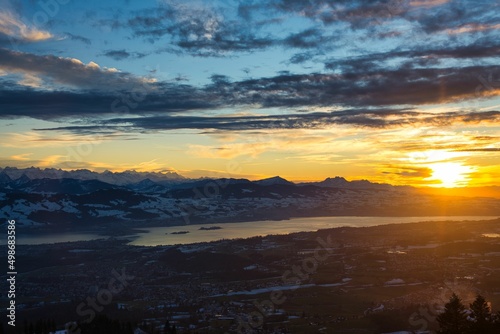 Top view from Bachtel Tower located at Zurich Oberland during Winter sunset time. Panorama view over lake of Zurich photo