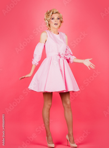 Surprised young woman. Emotion amazed excited woman. Costume party concept. Girl model with expressive facial expressions.