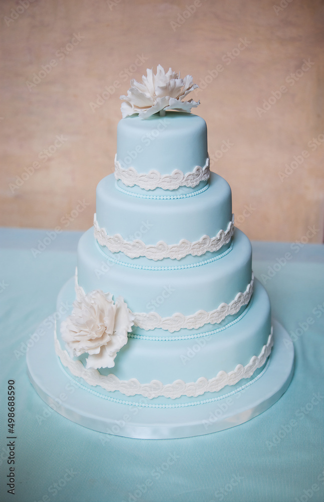 tiered wedding cake blue and white flowers tiered wedding cake blue and white flowers