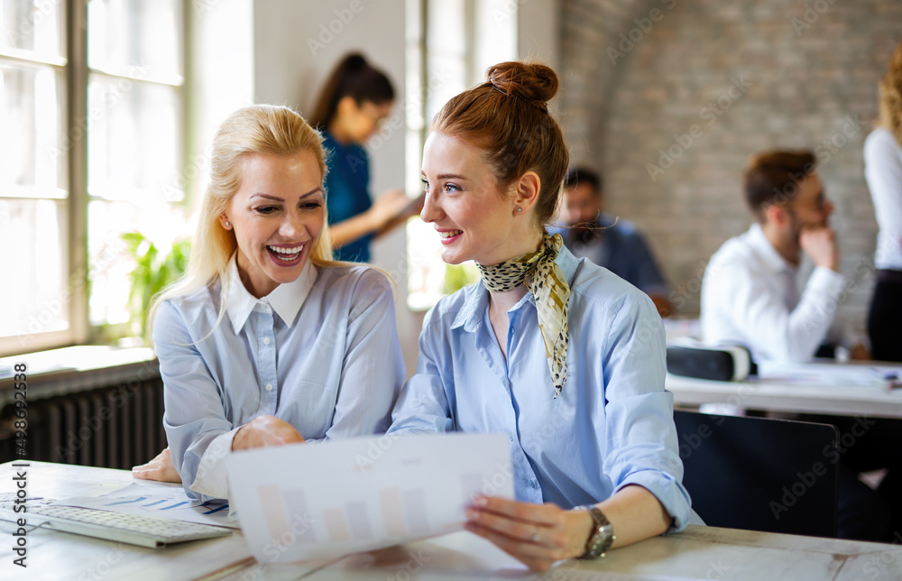 Group of multiethnic business people working at the office. Startup finance teamwork concept Group of multiethnic business people working at the office. Startup finance teamwork concept