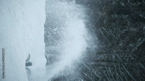 A jet of snow from a snowplow