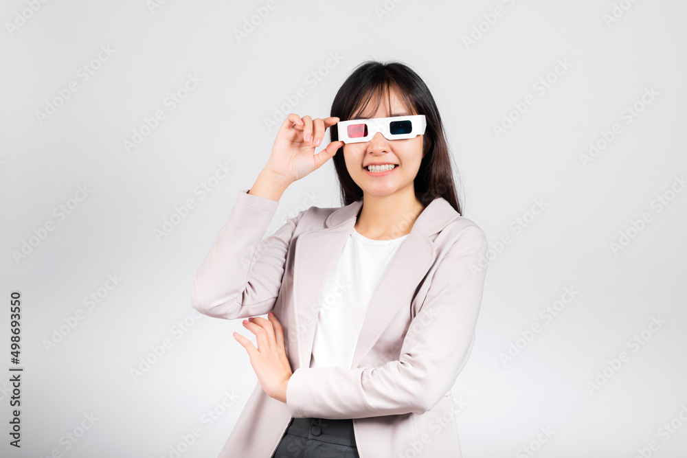 Smiling woman confidence wearing 3d cinema movie glasses red and blue isolated white background, Asian happy portrait beautiful young female in television film studio shot, copy space Smiling woman confidence wearing 3d cinema movie glasses red and blue isolated white background, Asian happy portrait beautiful young female in television film studio shot, copy space