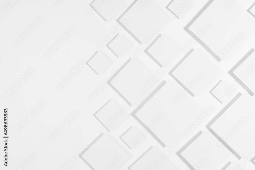 White geometric pattern of rhombuses in sunlight with soft light grey strict shadows as border, copy space, top view. Modern abstract background in futuristic style. White geometric pattern of rhombuses in sunlight with soft light grey strict shadows as border, copy space, top view. Modern abstract background in futuristic style.