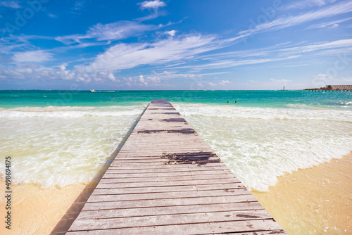 Cancun Mexico beautiful caribbean sea on a sunny day and cloudy sky. sandy beach © Birol
