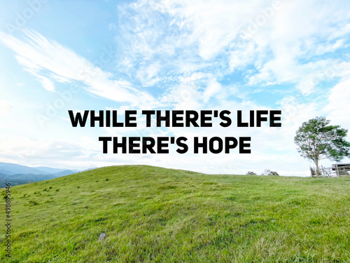 Inspirational motivational quote. While there's life, there's hope. Text with nature background.