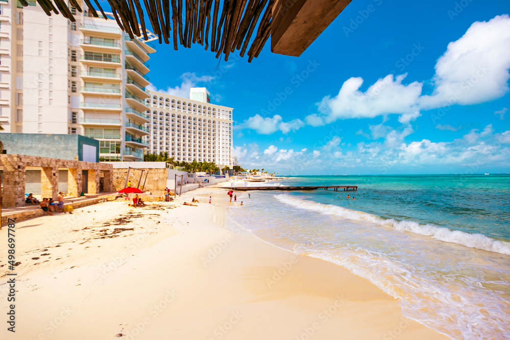 Cancun Mexico beautiful caribbean sea on a sunny day and cloudy sky. Sandy beach Cancun Mexico beautiful caribbean sea on a sunny day and cloudy sky. Sandy beach