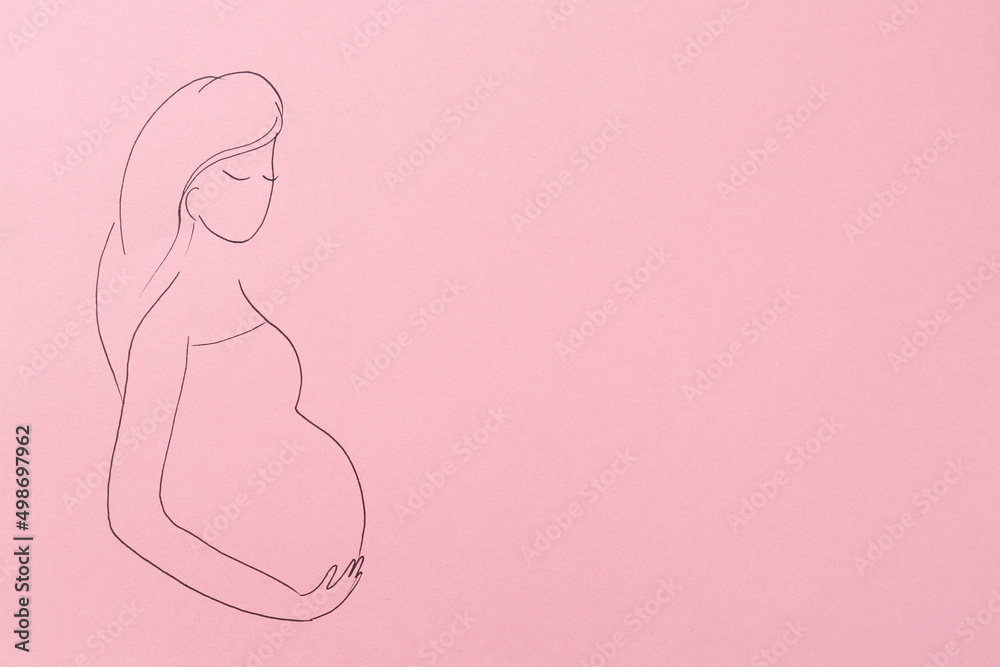 Pregnant woman figure drawn on pink background, top view with space for text. Surrogacy concept Pregnant woman figure drawn on pink background, top view with space for text. Surrogacy concept