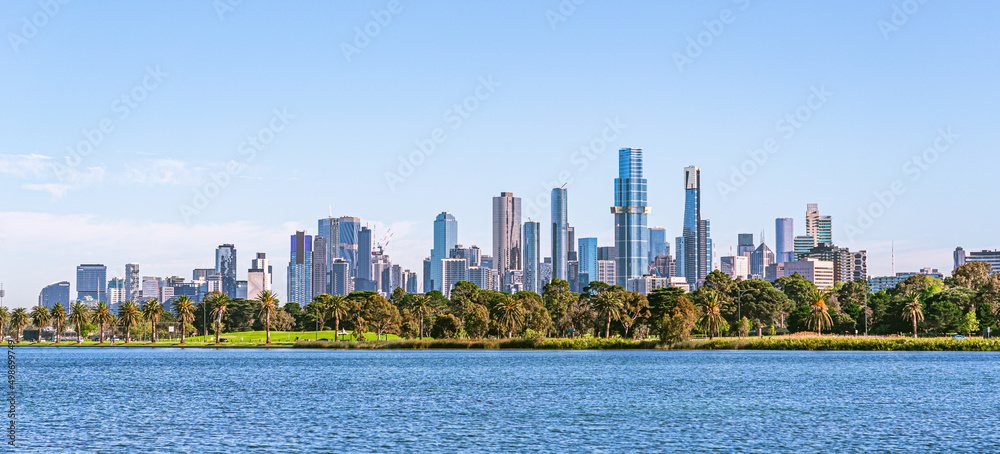 Fototapeta premium Melbourne cityscape with skyscrapers, blue sky and Yarra River.