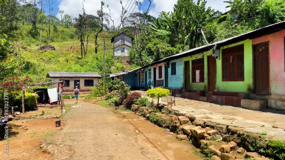 Sri Lanka moutain village at knuckles with colorful houses pan Sri Lanka moutain village at knuckles with colorful houses pan