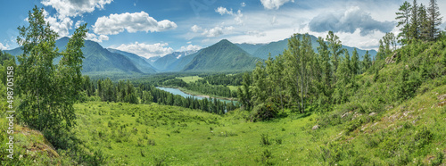 Picturesque mountain valley on a sunny summer day, panoramic view