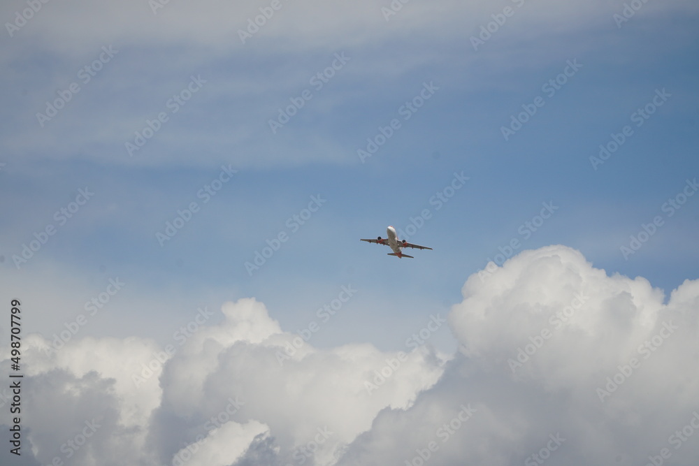 Plane is flying over clouds