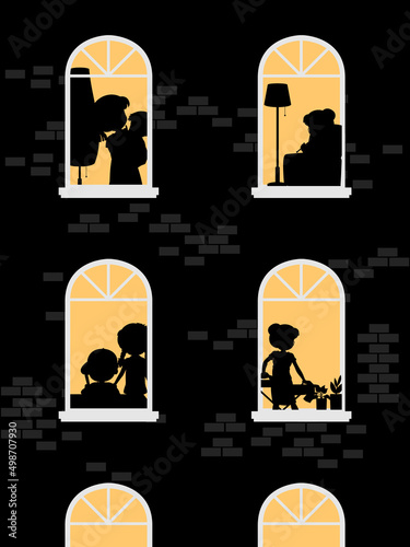 Night windows building with people silhouettes
