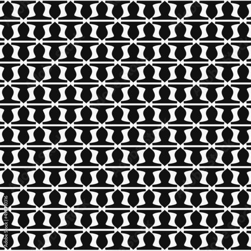 Black repeating shapes, and the same upside down throughout the pattern. Vector shapes in a seamless pattern.