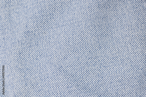 Blue jeans background texture. Copy space for the text.