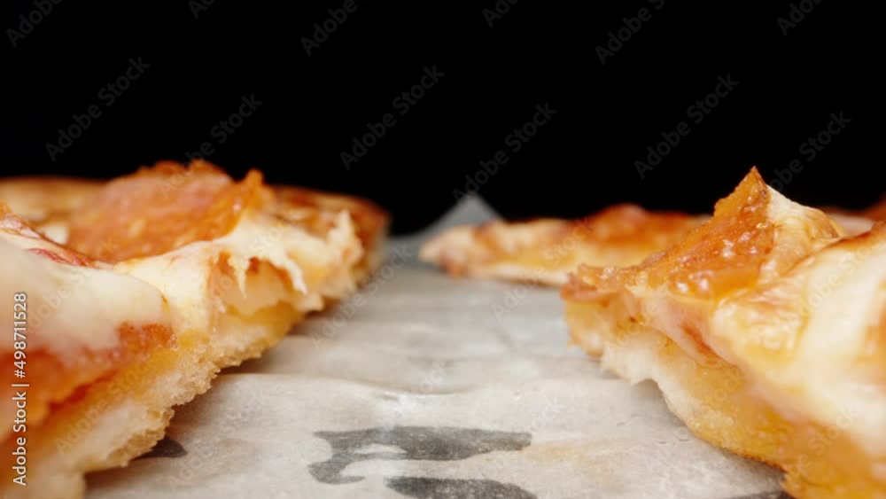 Pizza in a box on the table. Dolly slider extreme close-up. Laowa Probe Pizza in a box on the table. Dolly slider extreme close-up. Laowa Probe