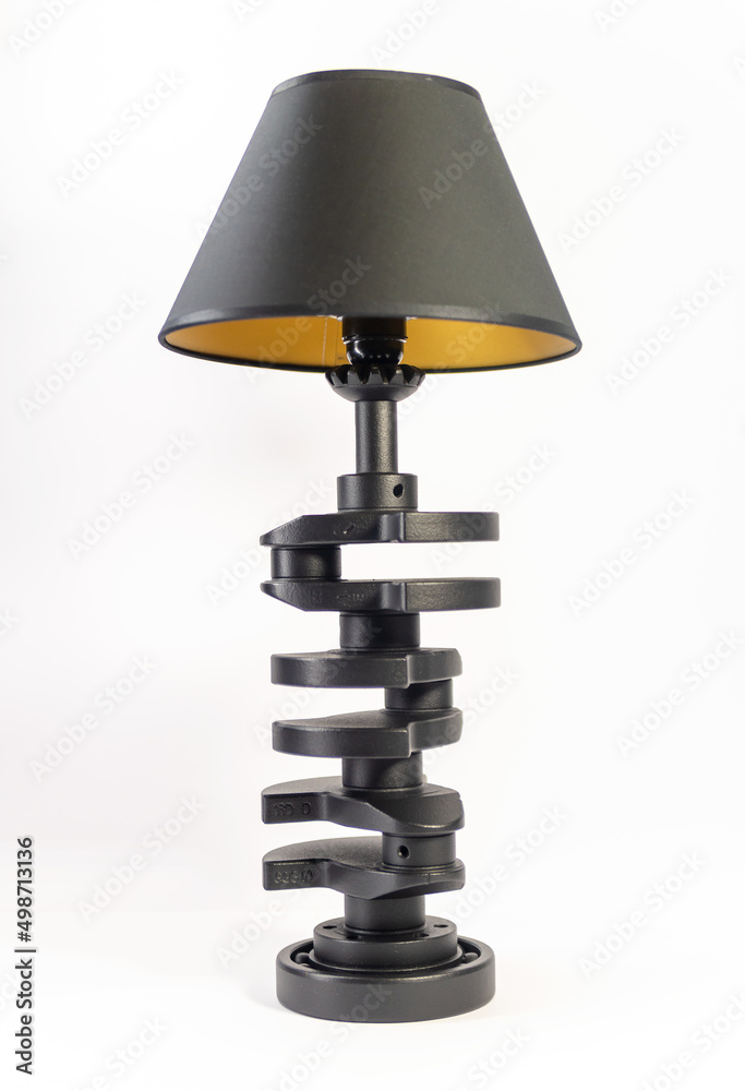Modern table lamp with small lampshade isolated from car parts