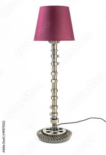 Modern table lamp with small lampshade isolated from car parts