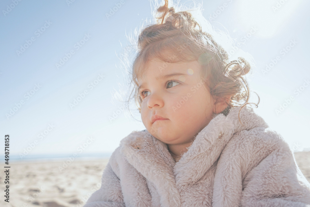 Portrait of a little girl in a winter sunny day Portrait of a little girl in a winter sunny day