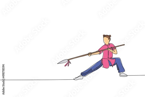 One continuous line drawing of young wushu master woman kung fu warrior in kimono with spear on training. Martial art sport contest concept. Dynamic single line draw design vector graphic illustration
