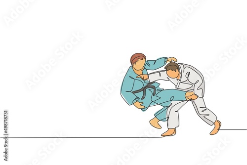 Single continuous line drawing of two young sportive judoka fighter men practice judo skill at dojo gym center. Fighting jujitsu, aikido sport concept. Trendy one line draw design vector illustration