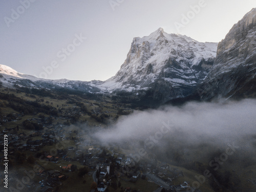 Drone shoot snow covered mountains in winter in Grindelwald
