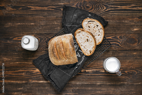 Overhead view of loaf of artisan sourdough bread with porous texture photo