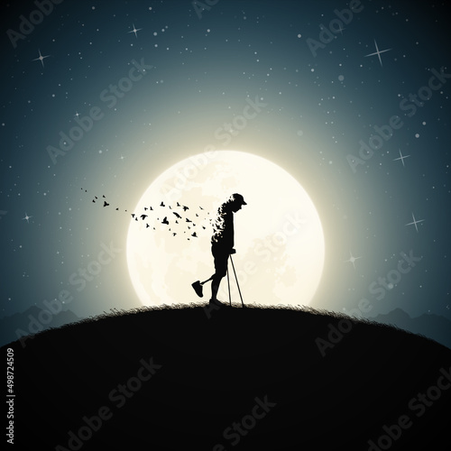 Disabled man on crutches silhouette. Death and afterlife. Full moon