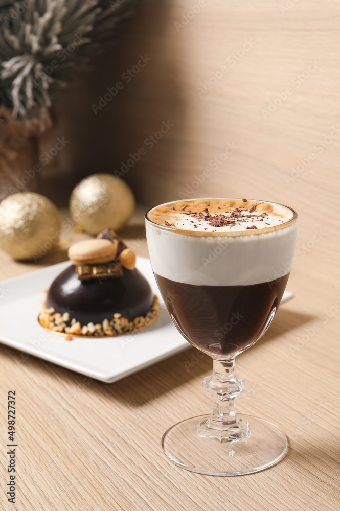 Aromatic coffee drink and delicious chocolate dessert on wooden table Aromatic coffee drink and delicious chocolate dessert on wooden table