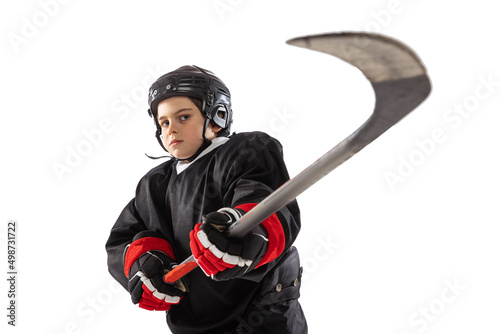 Photography Portrait of boy, child, hockey player posing, training isolated over white studi