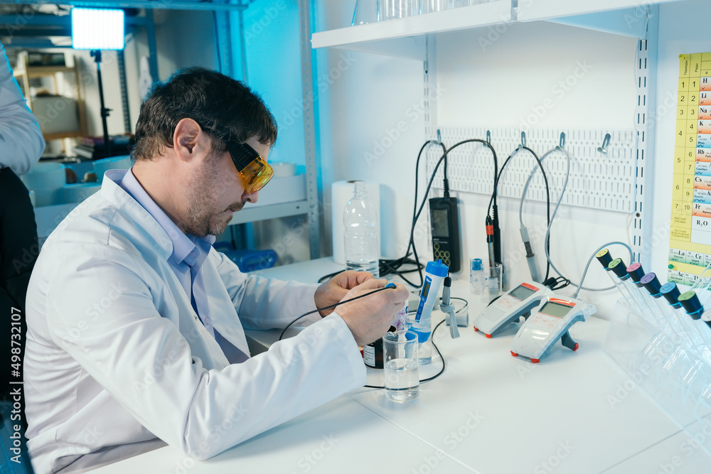 The scientist works in the laboratory. Research and biology concept The scientist works in the laboratory. Research and biology concept