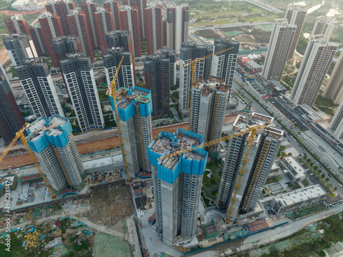 Aerial view of multistory apartment construction site in China © lzf