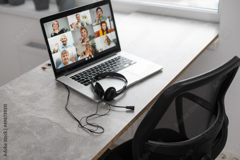 Online conference of colleagues through a laptop. Video call for training. Educational webinar chat between different people. Team meeting Online conference of colleagues through a laptop. Video call for training. Educational webinar chat between different people. Team meeting