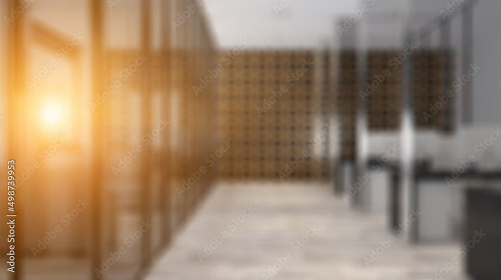Bokeh blurred phototography. Modern office building interior. 3D rendering. Sunset.
